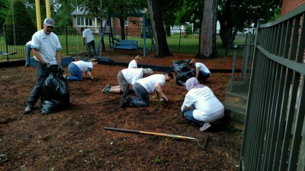 Volunteers working on a playground